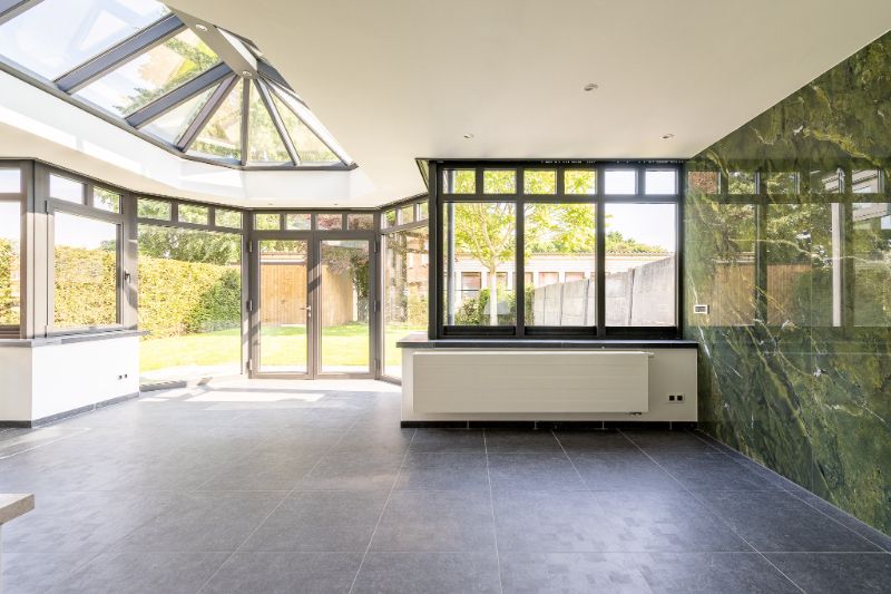 Volledig gerenoveerde halfopen bebouwing met tuin, veranda, kelder en vier slaapkamers in rustige buurt foto 6