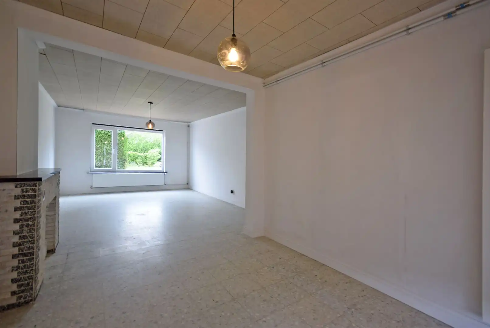 Ruime halfopen woning met grote tuin op toplocatie in Roeselare foto 4