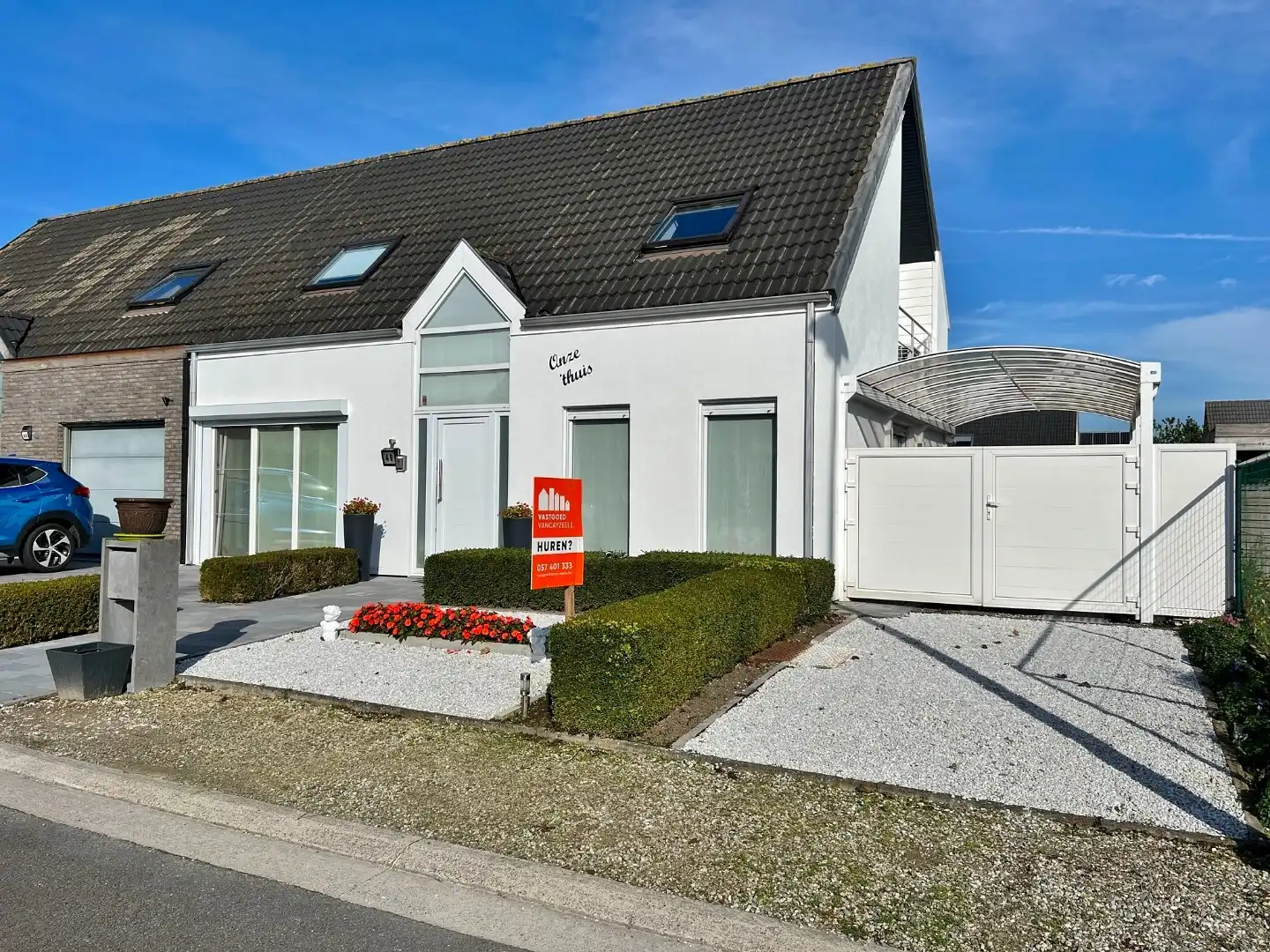 Instapklare woning met 4 slaapkamers, zonnige tuin en carport. foto {{pictureIndex}}