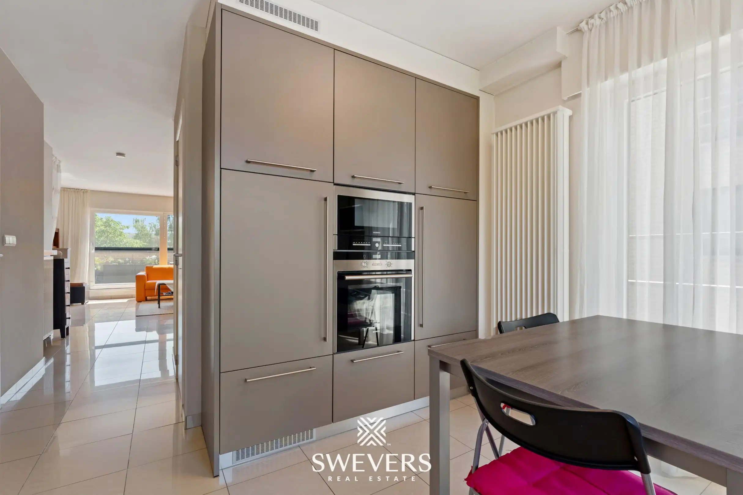 Instapklaar, lichtrijk duplex-appartement met ruim terras in hartje Helchteren foto 14