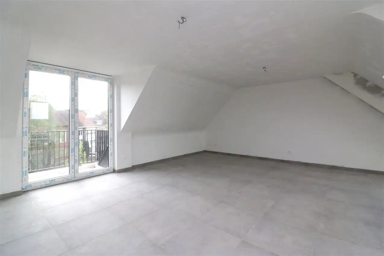 Uniek penthouse in centrum Aarschot met 1 slpk. parking en terras foto 5