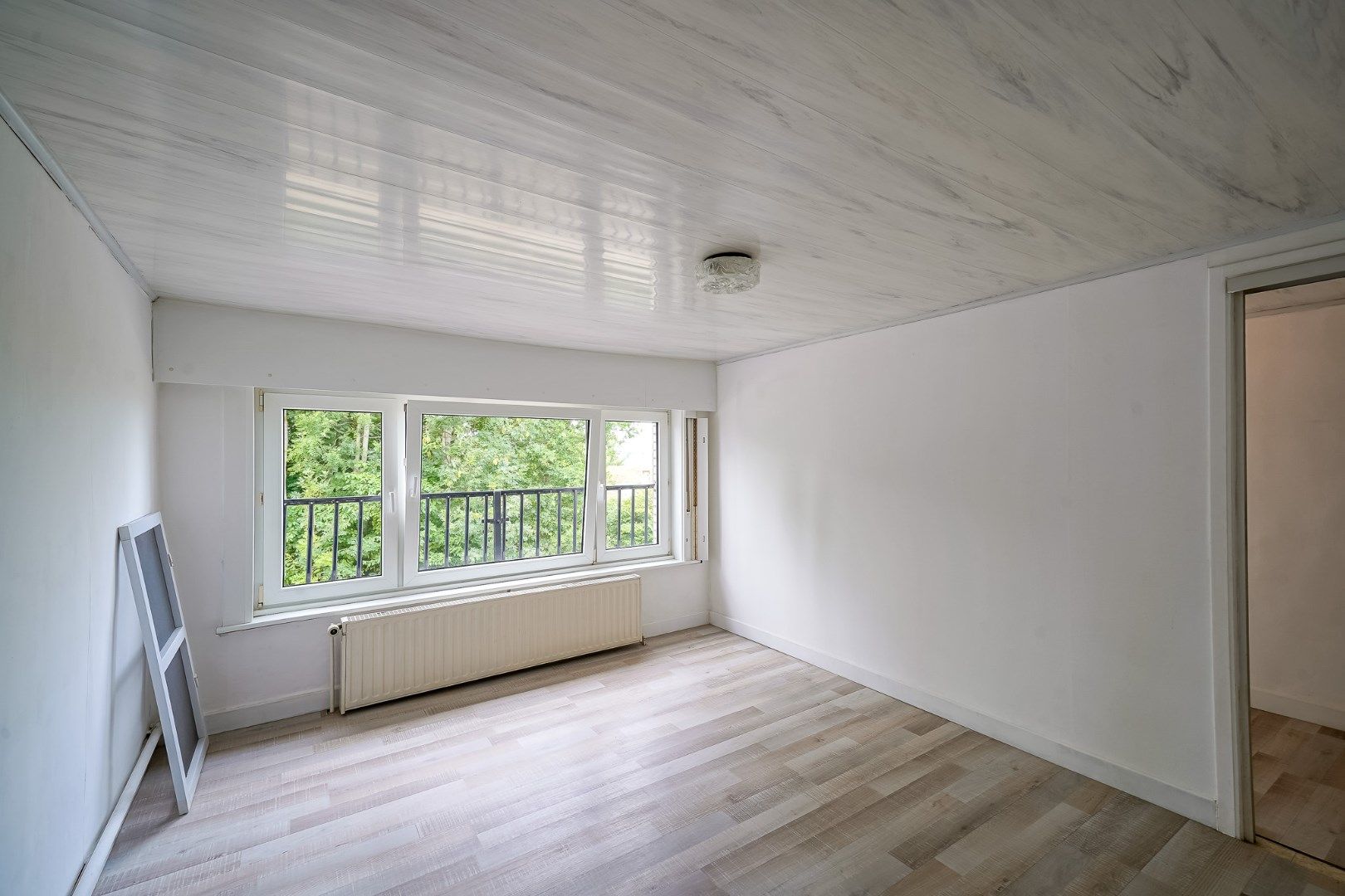 Rijwoning met 3 slaapkamers en tuin nabij de Spuikom foto 13
