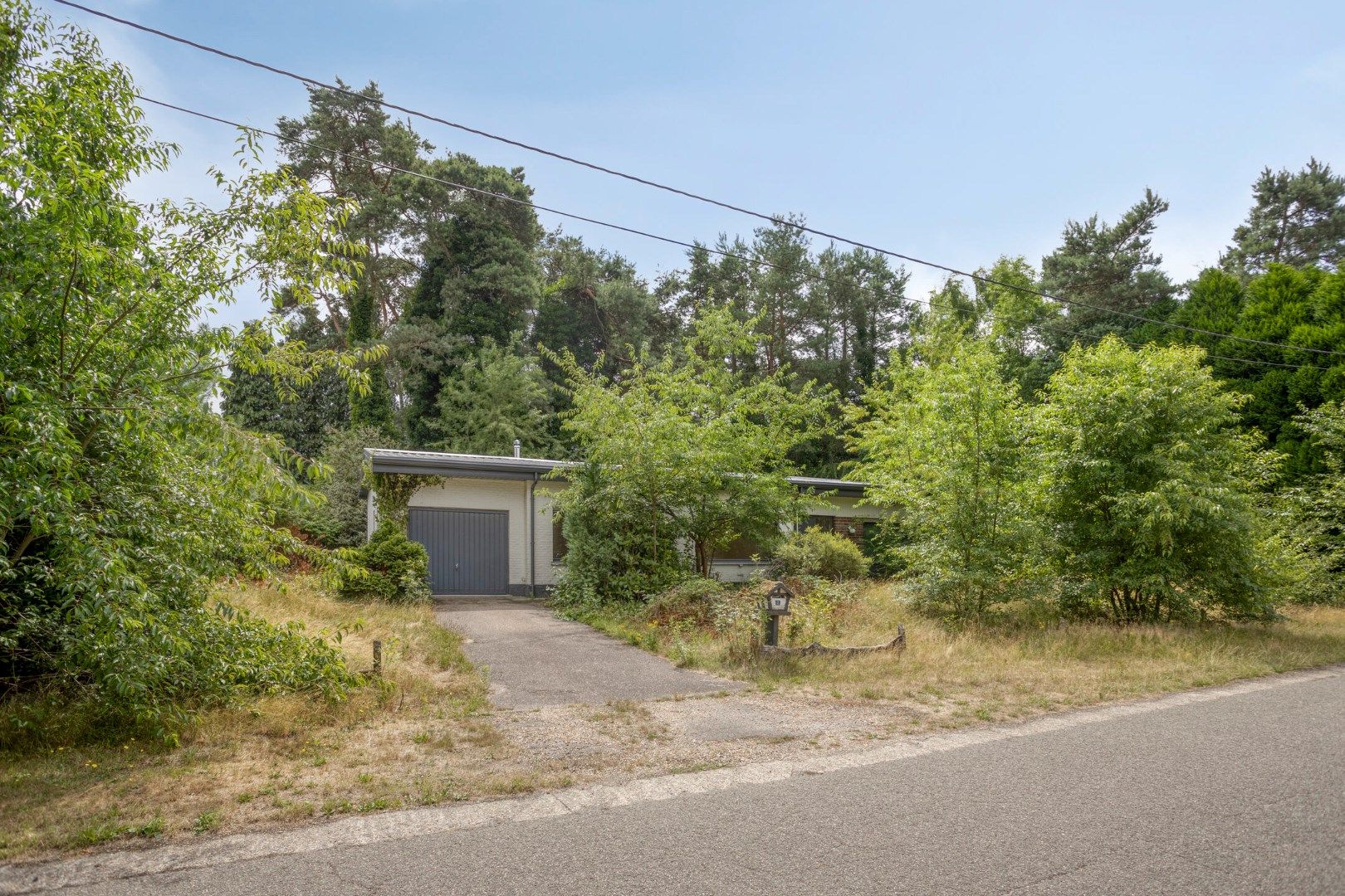 Te renoveren / te slopen woning op een uniek gelegen perceel van 1.693 m² ! foto 17
