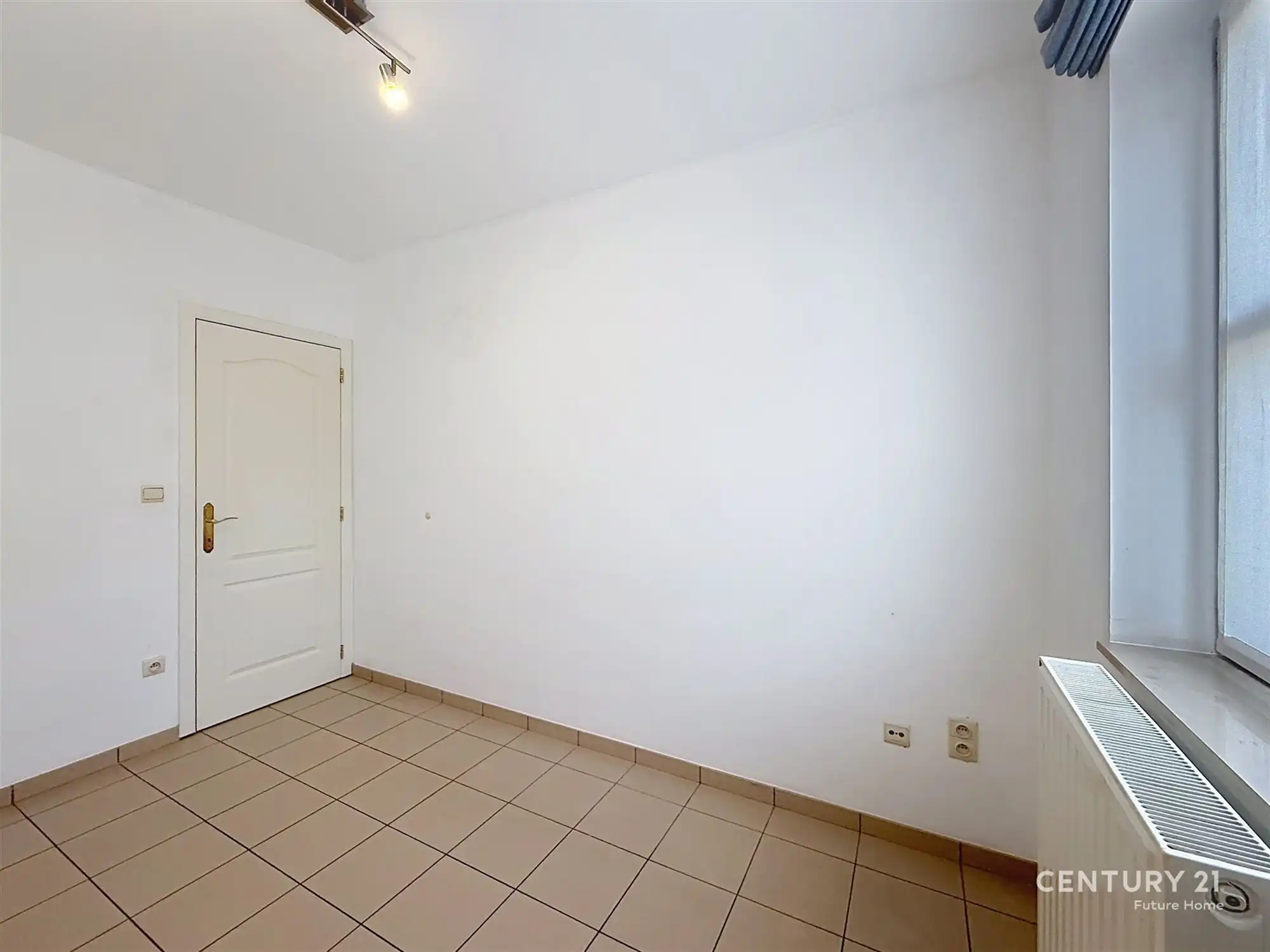 Gelijkvloers appartement met overdekt terras en tuin! foto 7