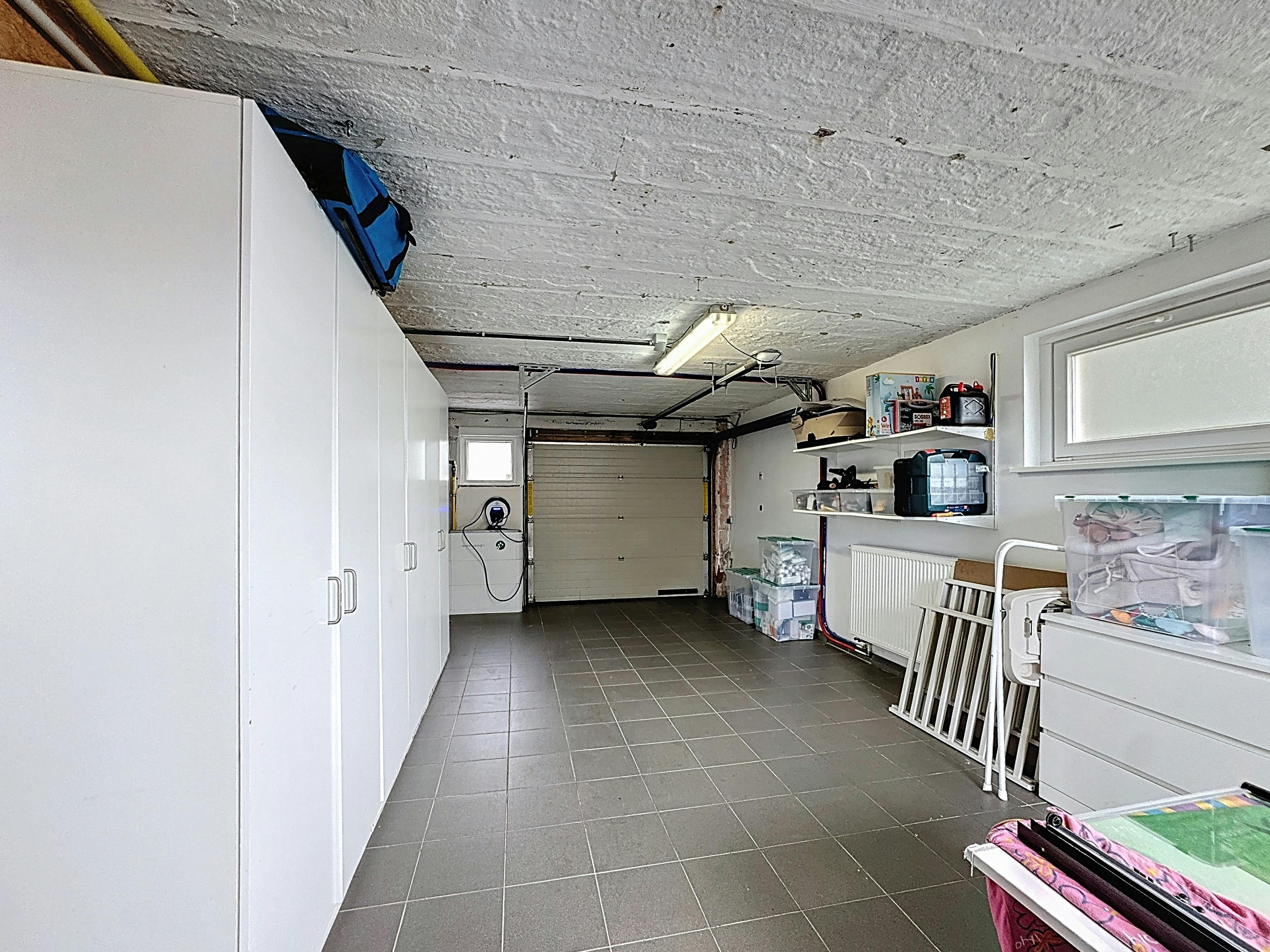 Lichtrijk en instapklaar huis met tuin te koop in Heist foto 13