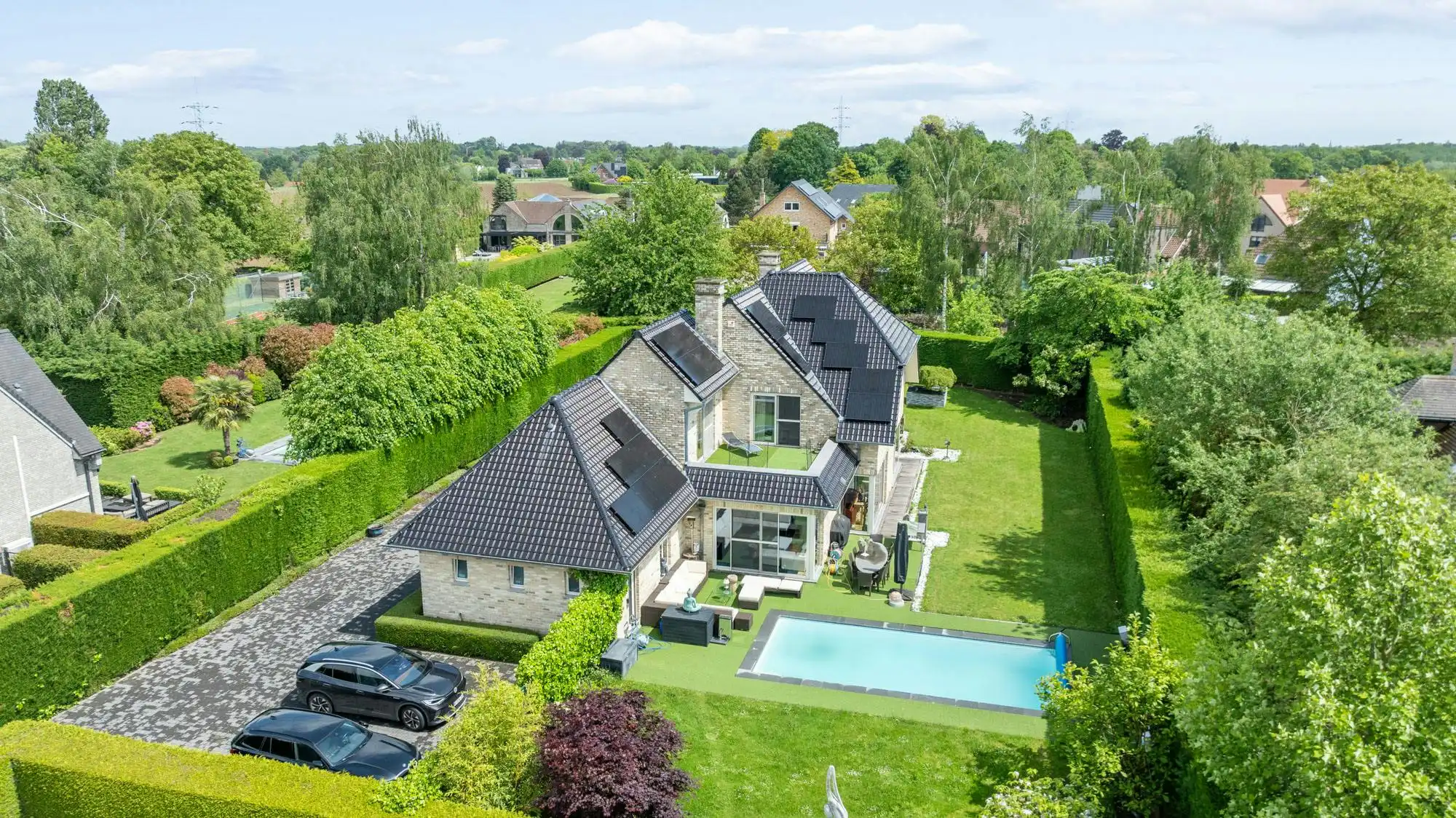 Exclusieve villa met  zwembad op een toplocatie in Wemmel foto {{pictureIndex}}