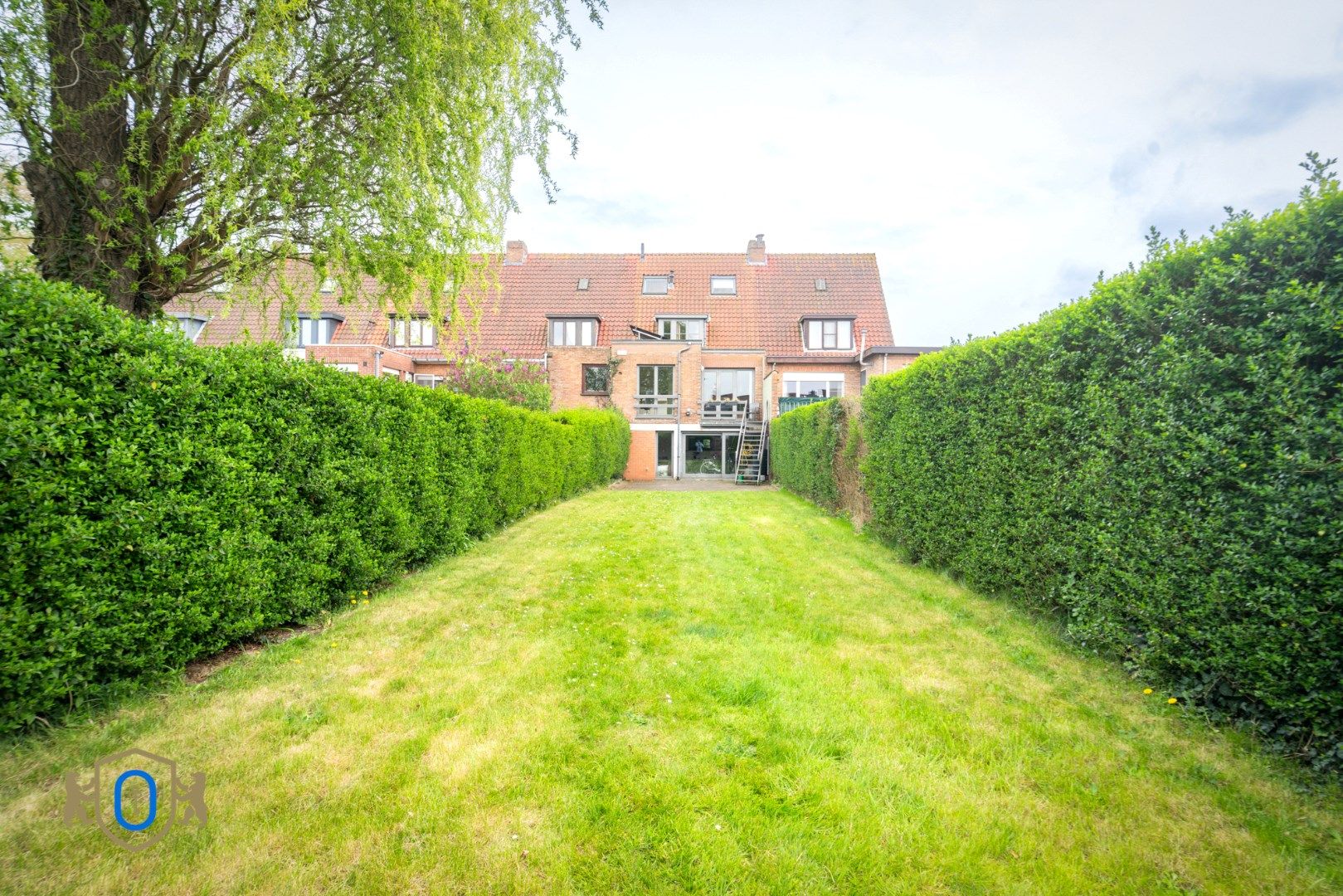 Charmante tussenwoning met tuin foto 28