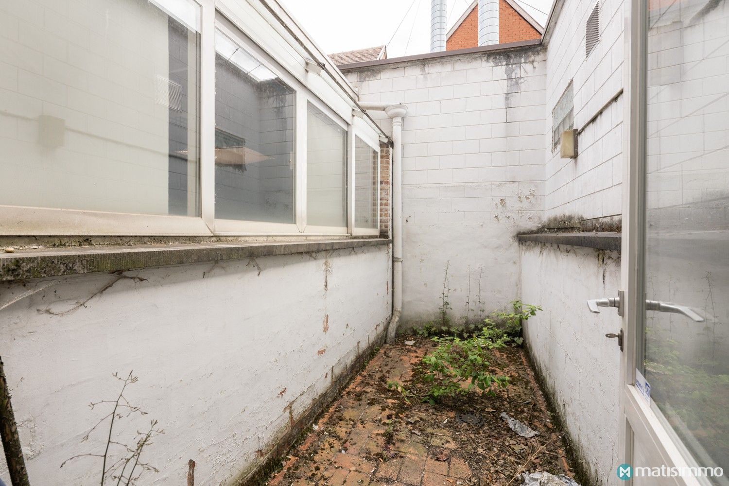 GOED GELEGEN PROJECT VOOR 3 APPARTEMENTEN + 6 AUTOSTAANPLAATSEN IN CENTRUM BILZEN foto 17