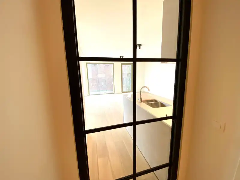 Instapklaar recent appartement met 2 slaapkamers foto 4