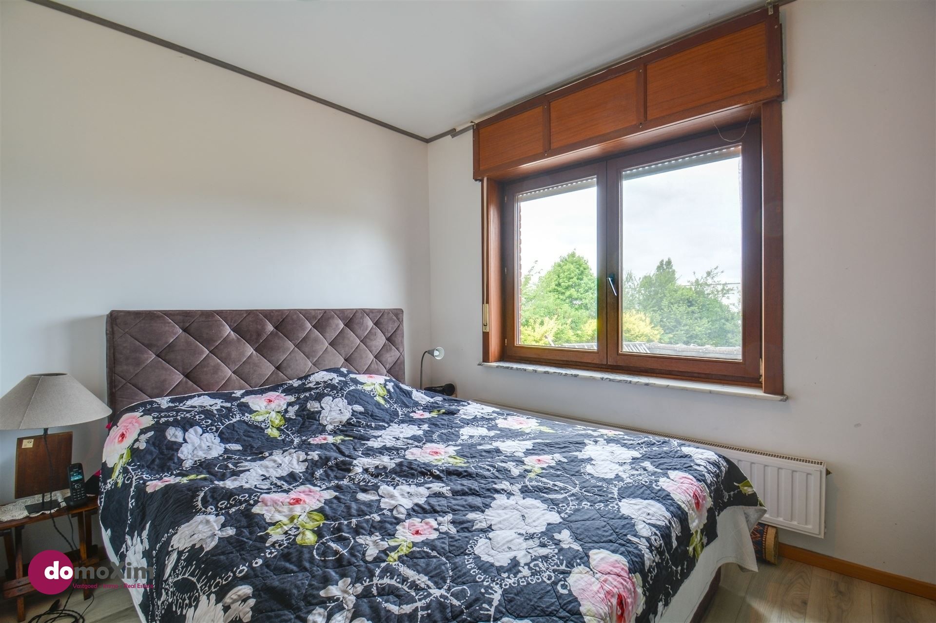 Instapklare woning met 3 slaapkamers en tuin in een rustige buurt foto 14