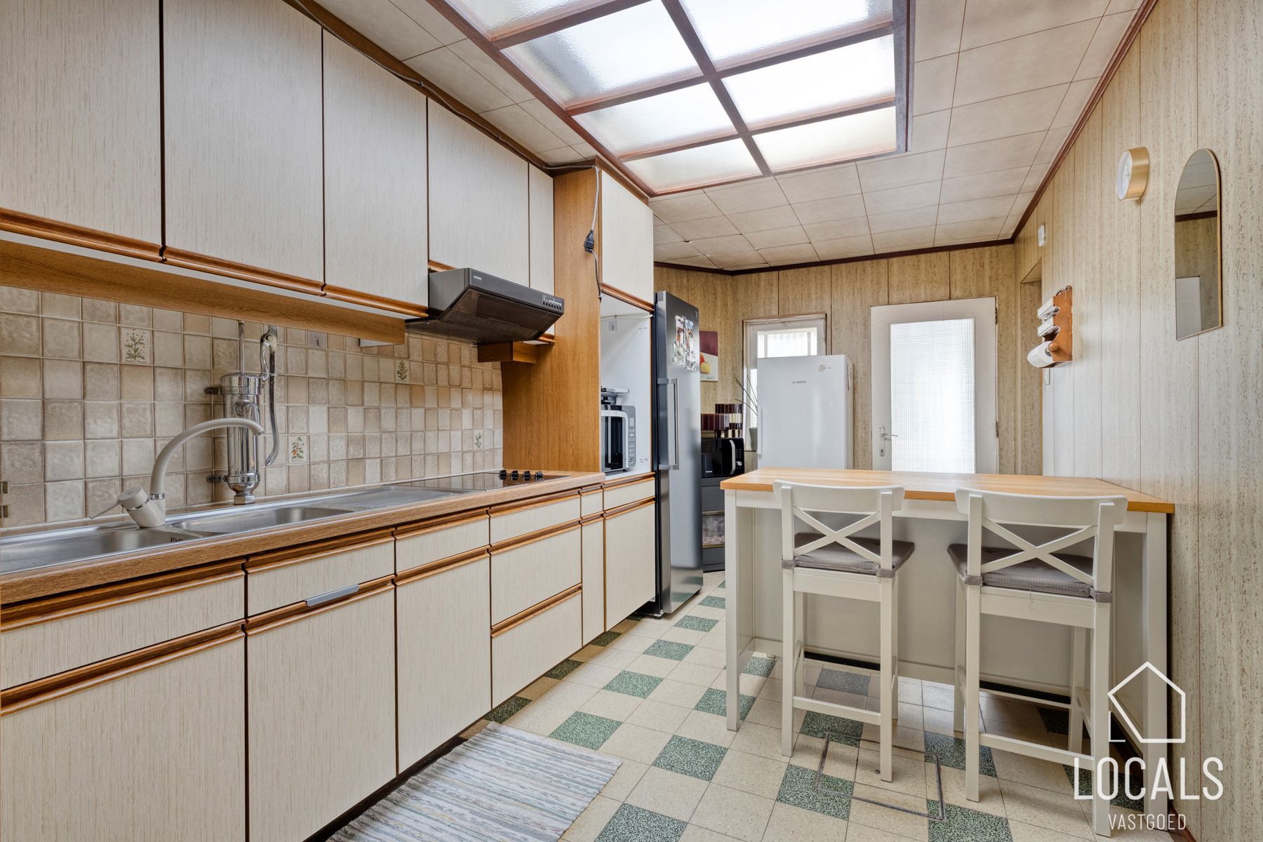 Deels gerenoveerde woning met stadstuin in hartje Ninove foto 6