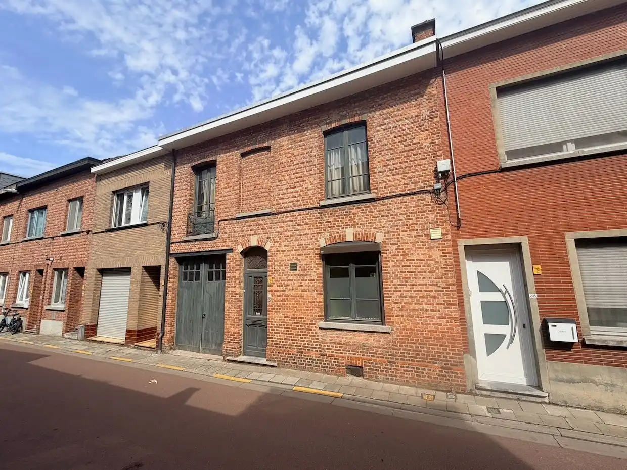 Ruime rijwoning met 4 slaapkamers, garage en tuin op toplocatie in Heverlee foto 2