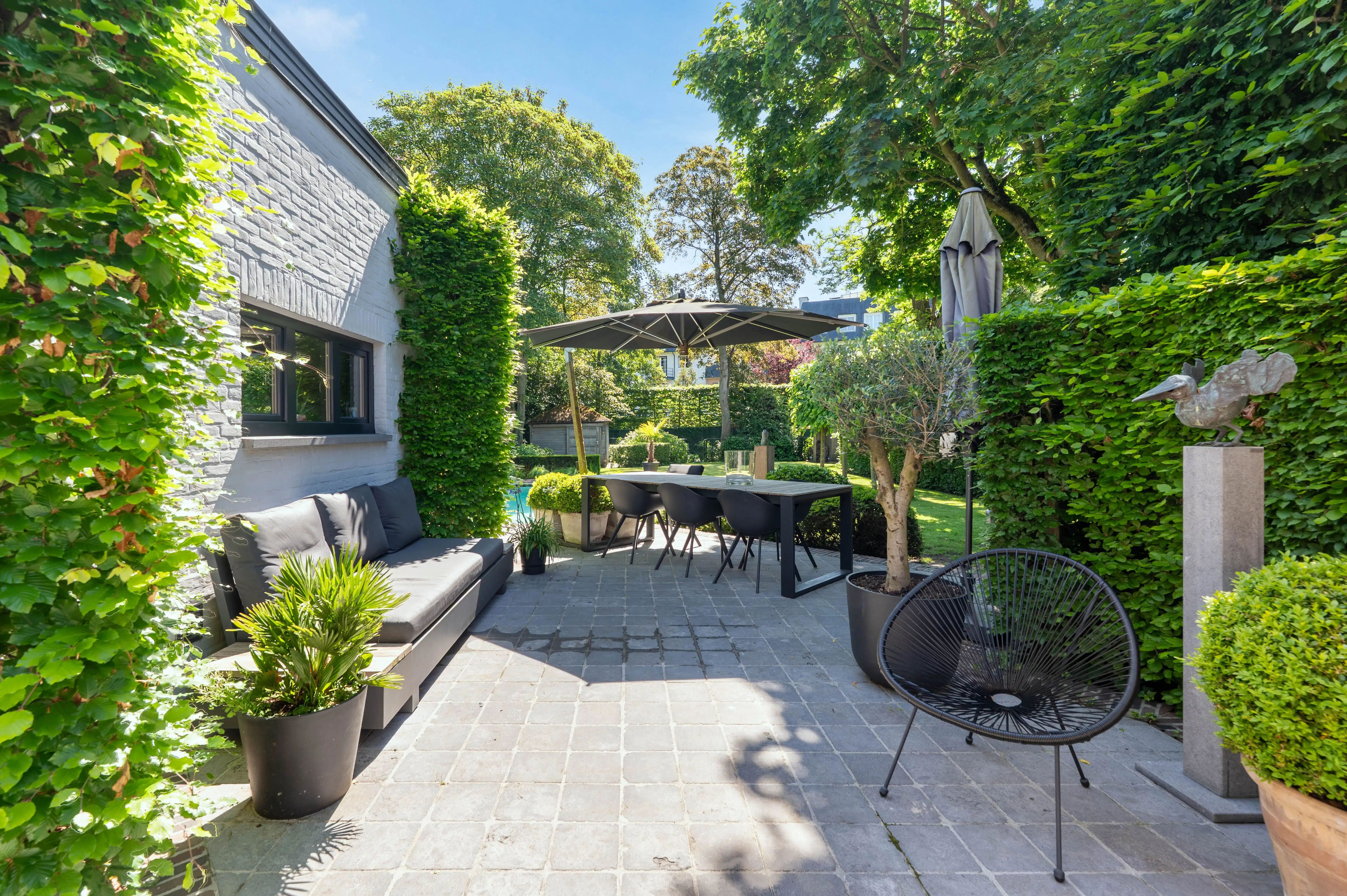 Karaktervolle herenwoning met verwarmd zwembad in hartje Kapellen. foto 31