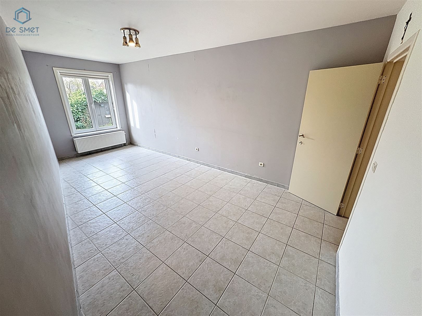 Ruime kangoeroewoning met 5 slaapkamers, 2 garages en tuin in rustige buurt van Brakel foto 9