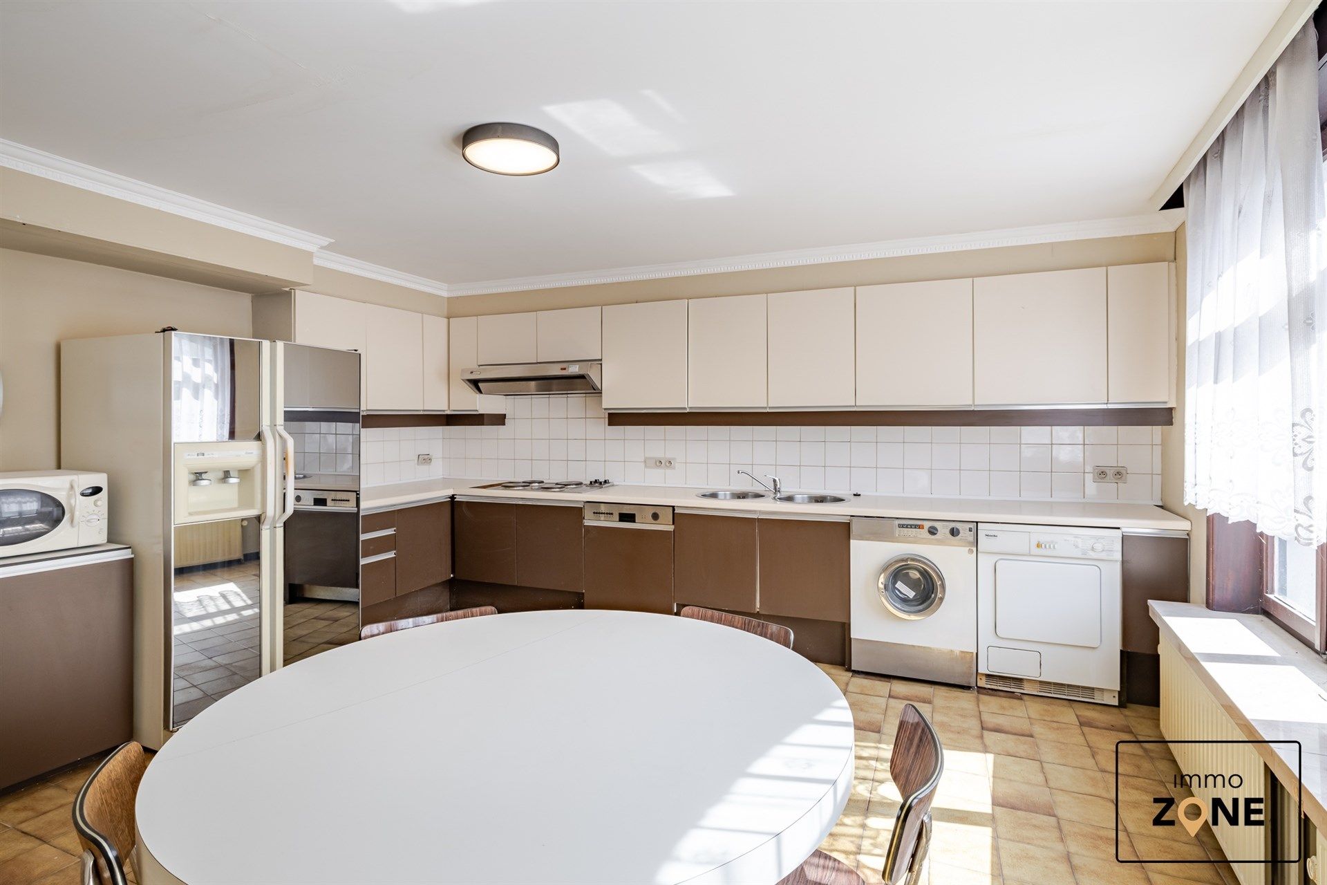 Handelspand met appartement te koop in het centrum van Hamme foto 14