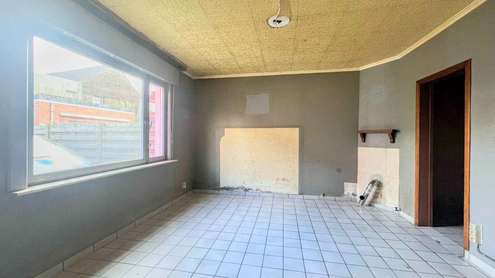 Betaalbare renovatiewoning in het gezellige Uikhoven foto 4