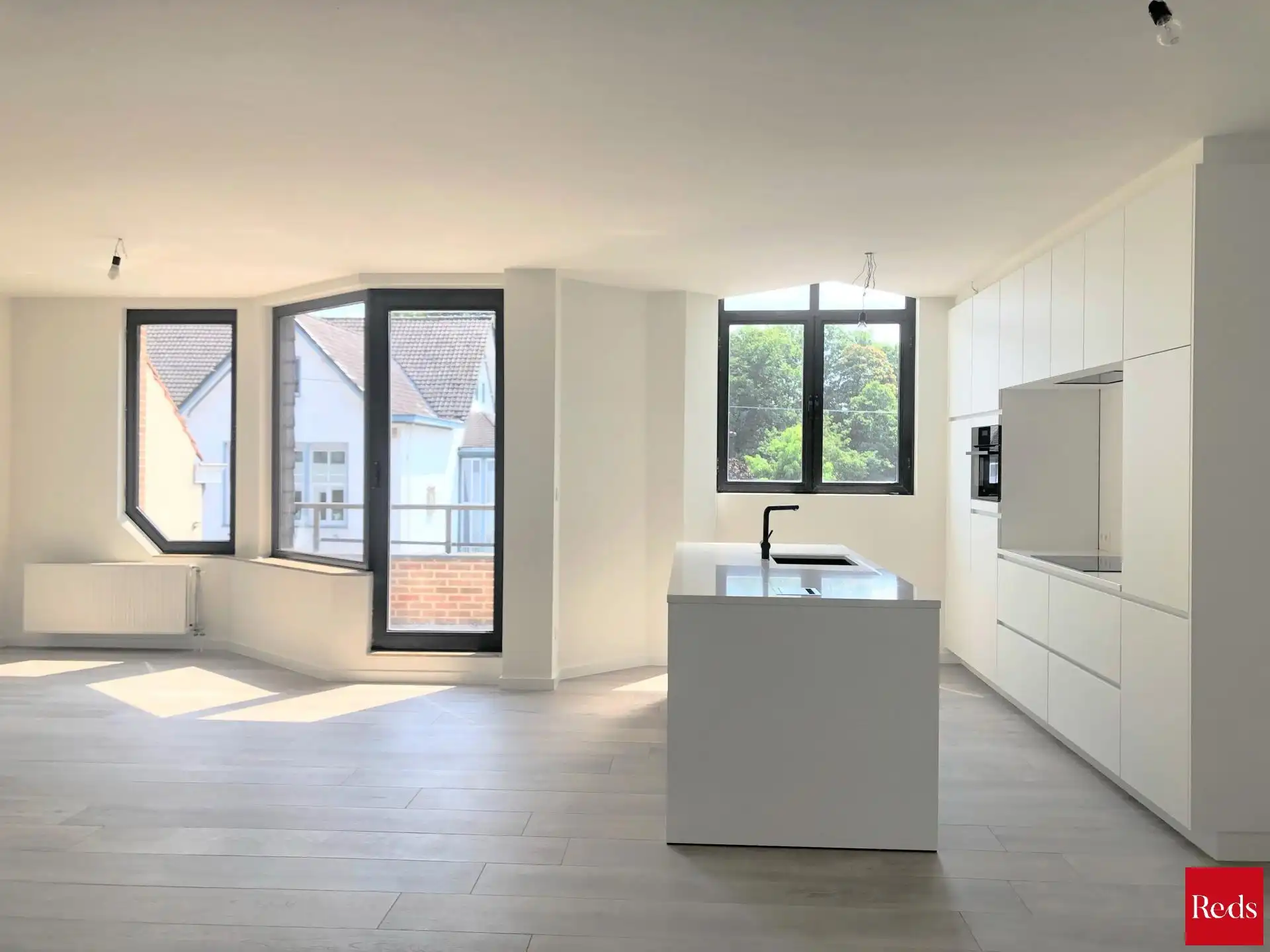 Gerenoveerd appartement te huur op de tweede verdieping in het centrum van Schilde! foto 5