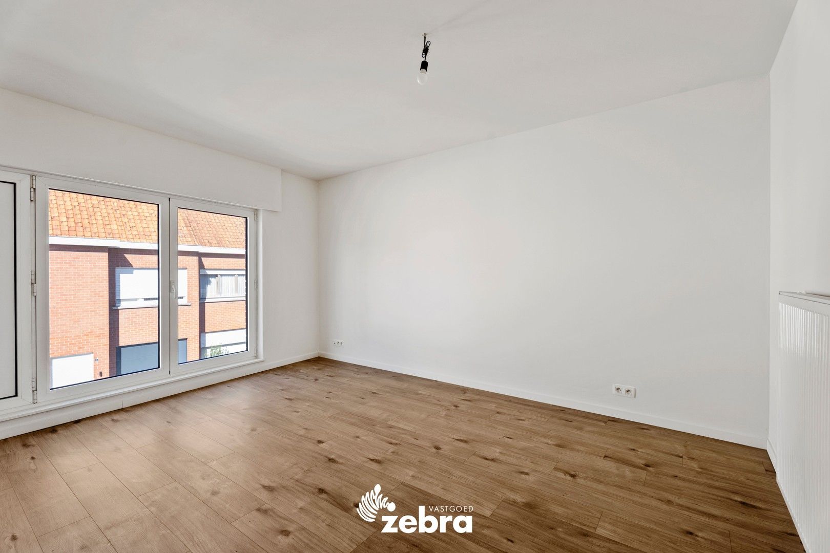 Volledig gerenoveerde woning met drie slaapkamers te Meulebeke! foto 13