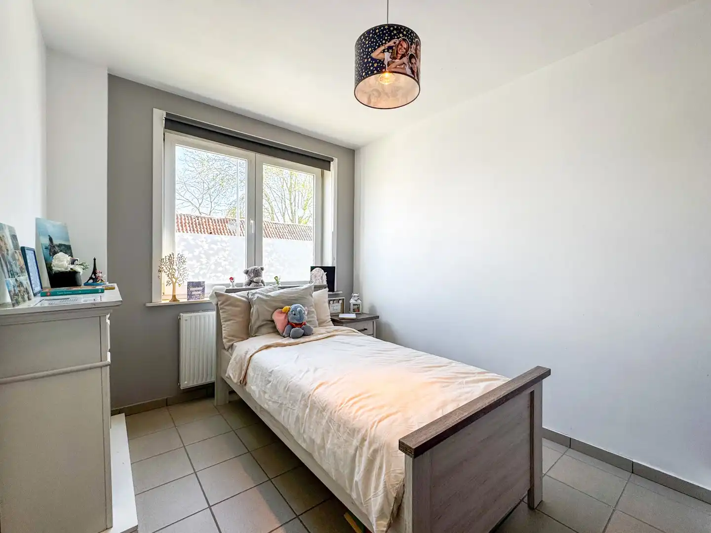 Gezellige rijwoning met 4 slaapkamers, tuin en carport foto 12