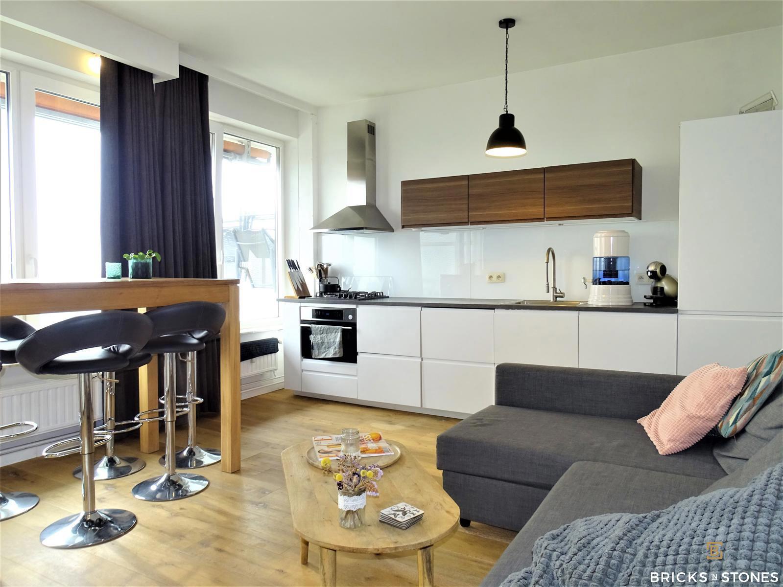 Gezellig bemeubeld appartement met panoramisch Schelde zicht foto {{pictureIndex}}