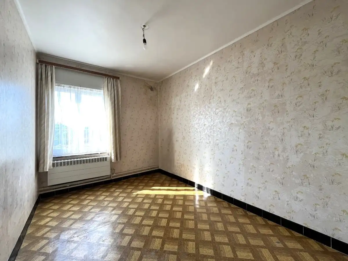 Moorslede – Halfopen woning met veel potentieel foto 11