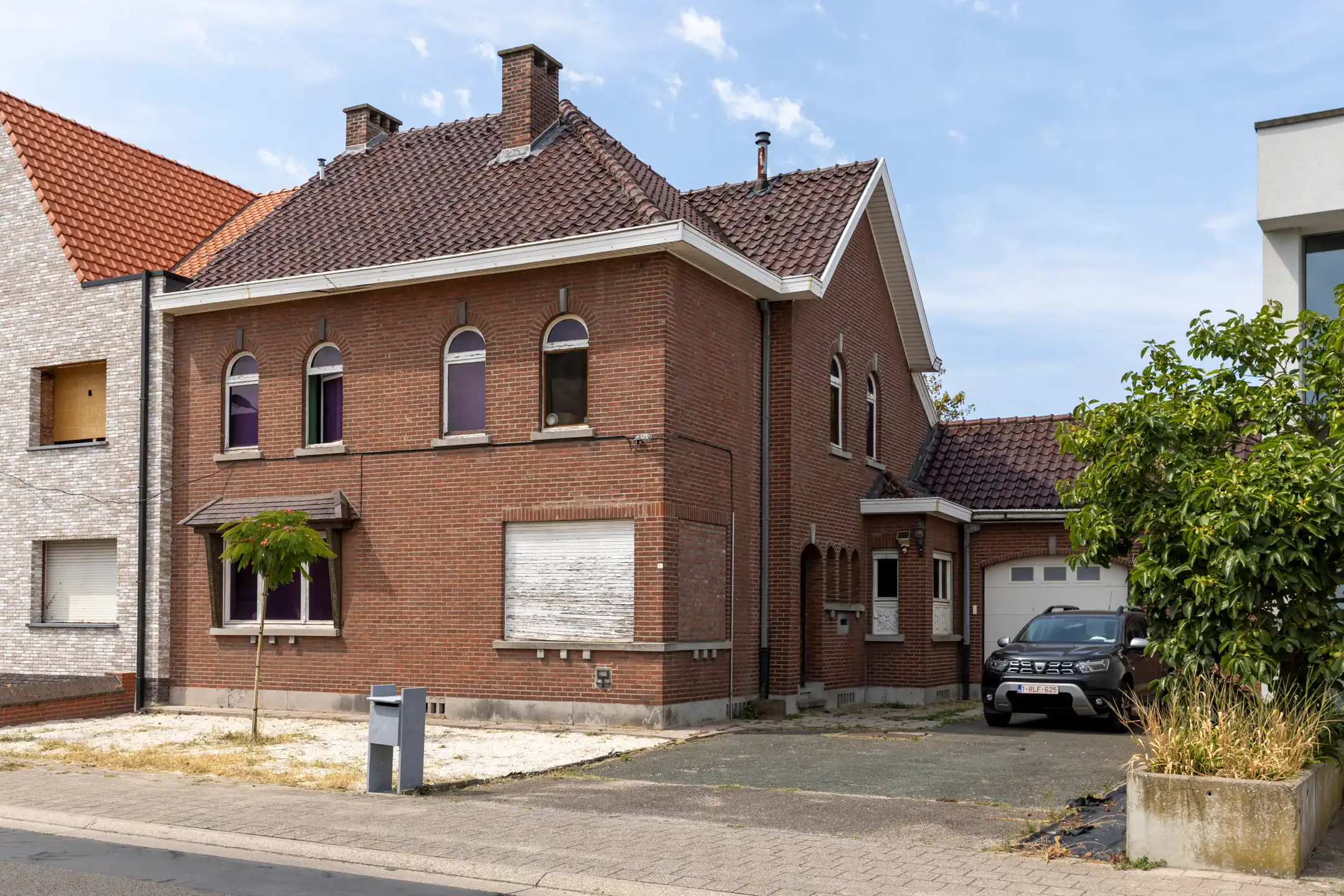 Te renoveren gesloten bebouwing met garage, ruime tuin en groenzicht in Oppuurs foto 23