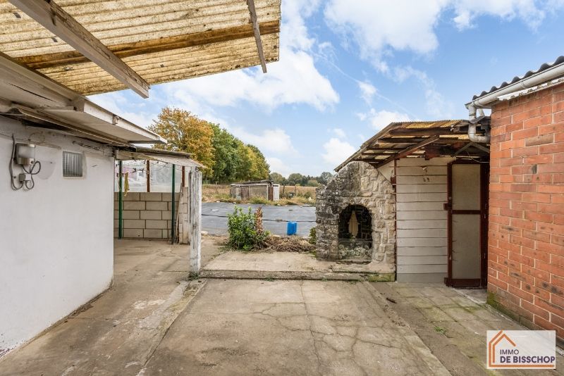 Te renoveren woning met 4 slaapkamers, zongerichte tuin en garage foto 16
