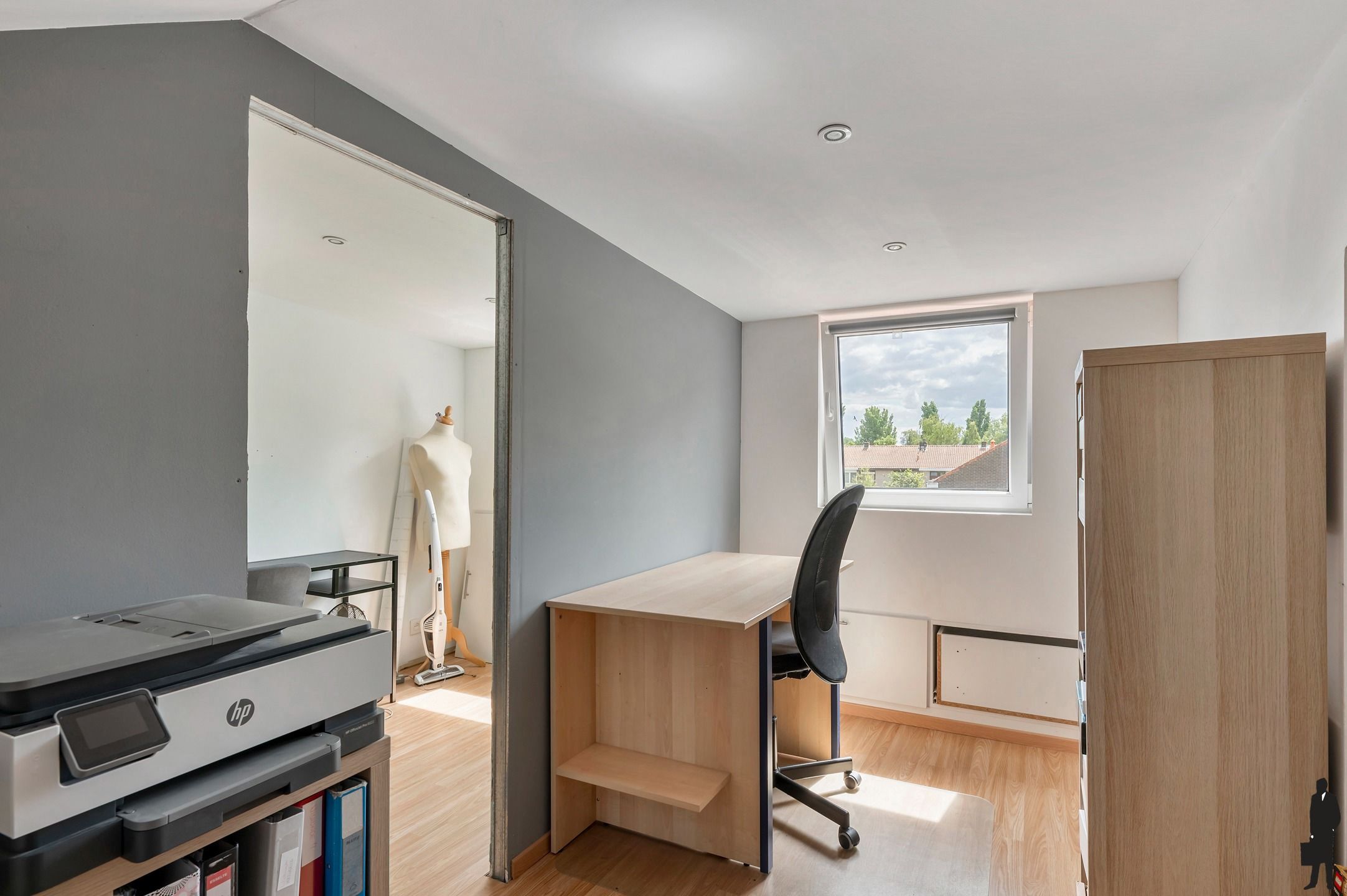 Instapklare gezinswoning met garage in een rustige straat ! foto 16