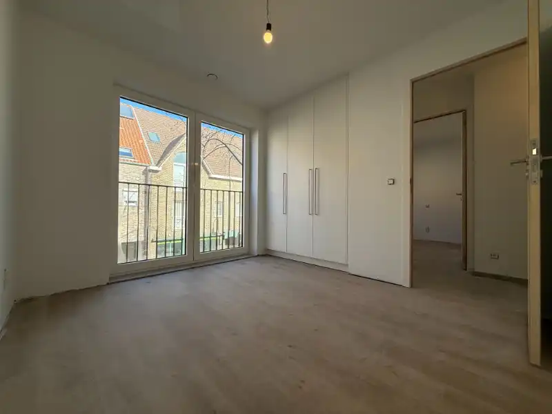 Modern BEN-appartement met 2 slaapkamers, terras en parking in het centrum van Houthalen foto 7