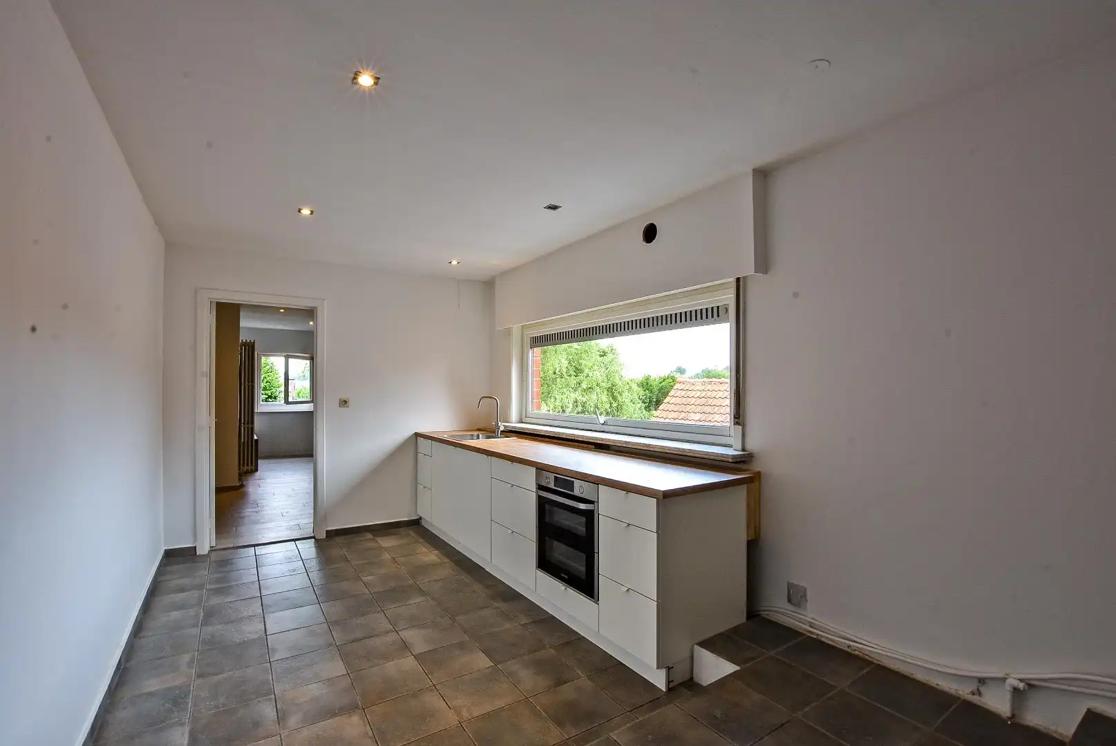 Halfopen bebouwing met mogelijkheid tot 7 slaapkamers, 2 badkamers en grote tuin in Aalter foto 16