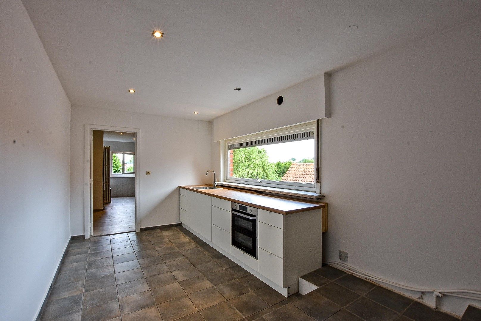 Halfopen bebouwing met mogelijkheid tot 7 slaapkamers, 2 badkamers en grote tuin in Aalter foto 16