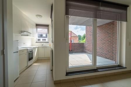 App. centrum Bilzen, rustige ligging, 2 slpk, parkeeruimte, terrasje. foto 6