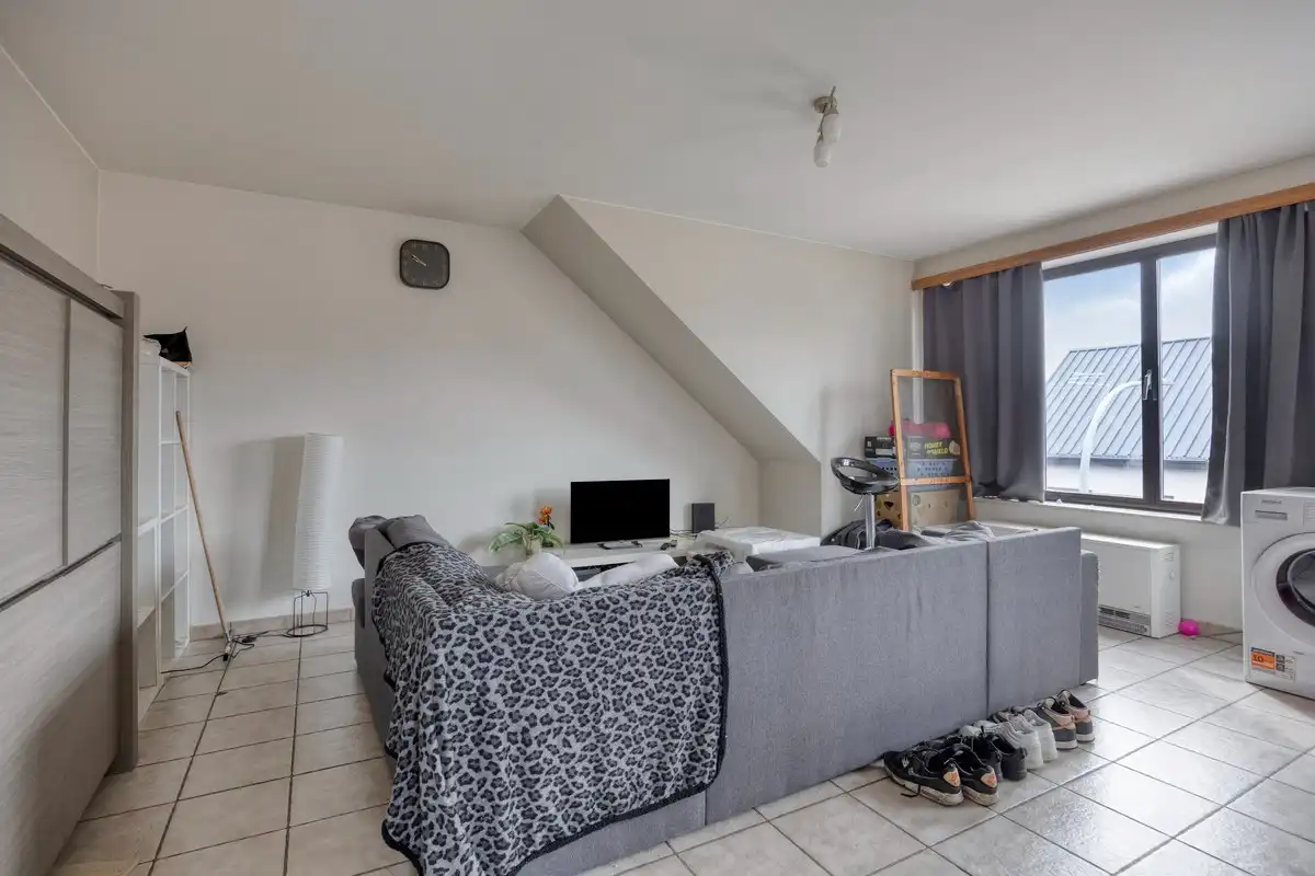 Opbrengsteigendom met 3 appartementen en 7 garages foto 14