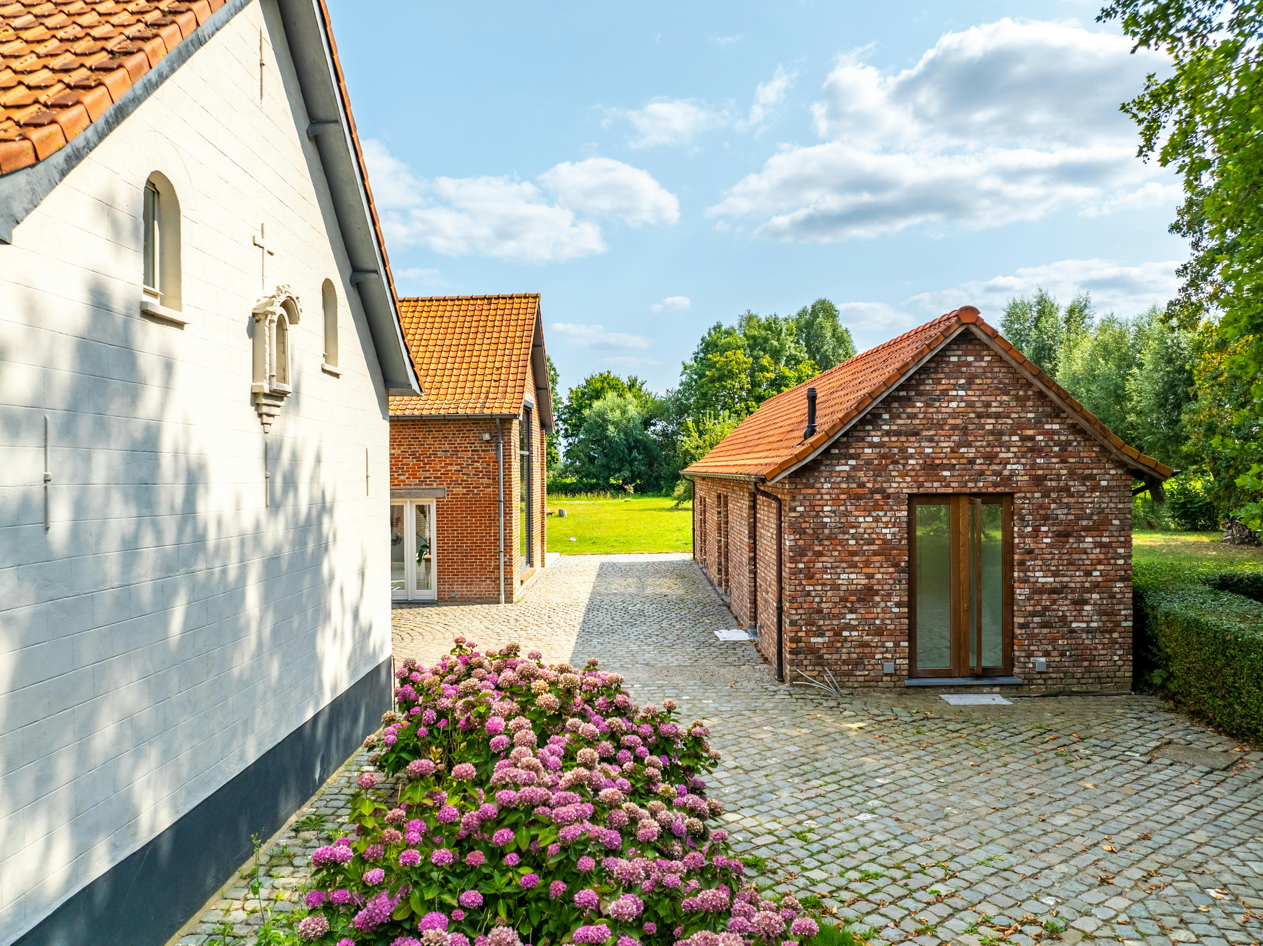 Exclusief landhuis op +/- 8000 m²: de synthese van rust en ruimte foto 7