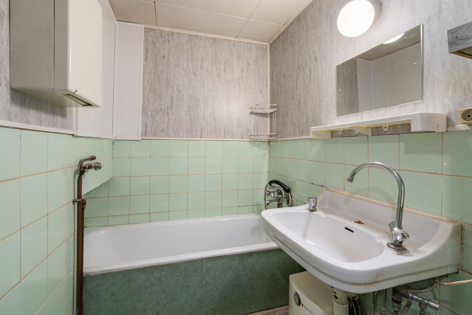 Te renoveren 2-slaapkamer appartement in het centrum van Erembodegem foto 9