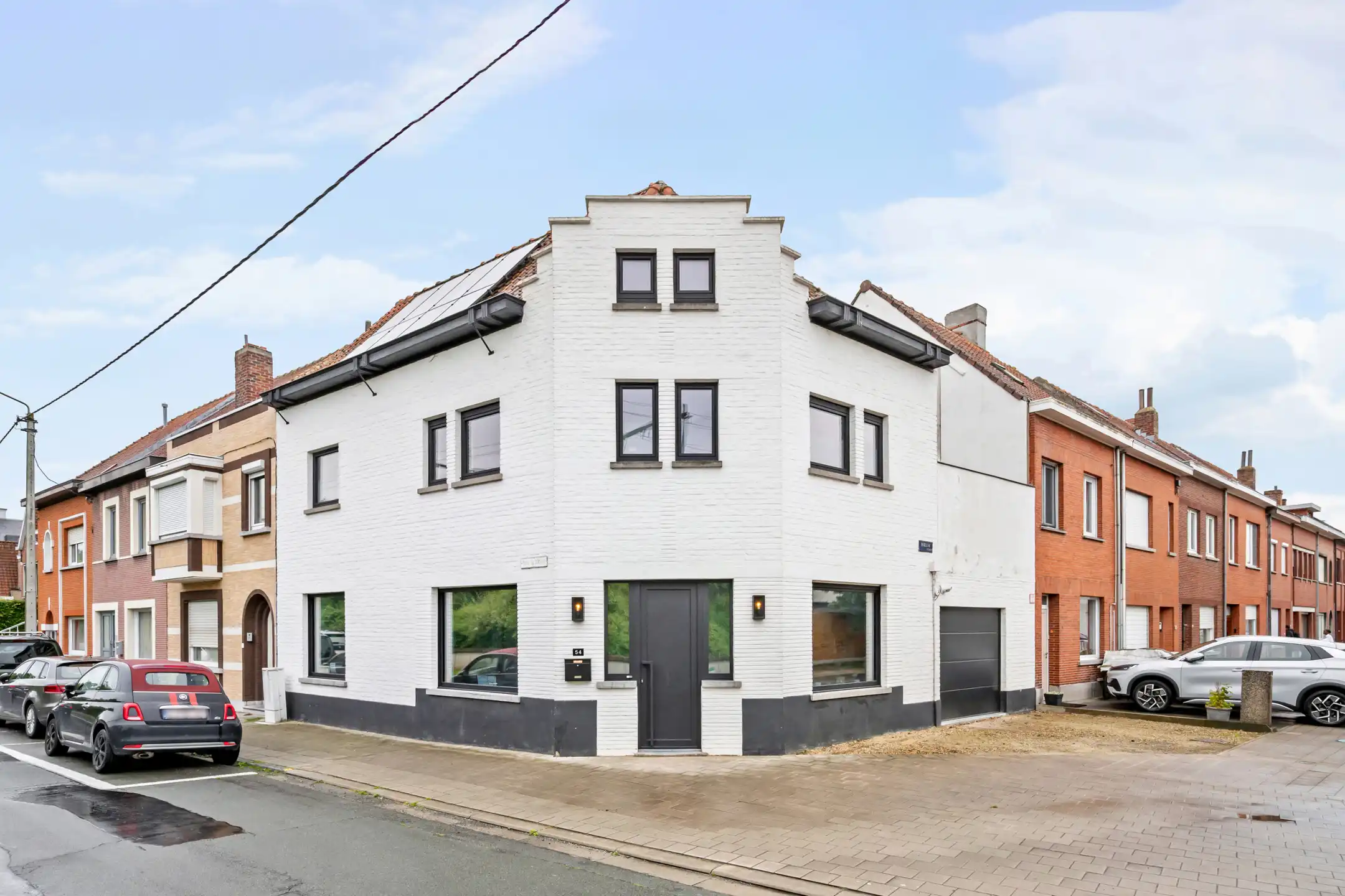 Instapklare woning met 3SLK, zonnige buitenruimtes en garage foto 2