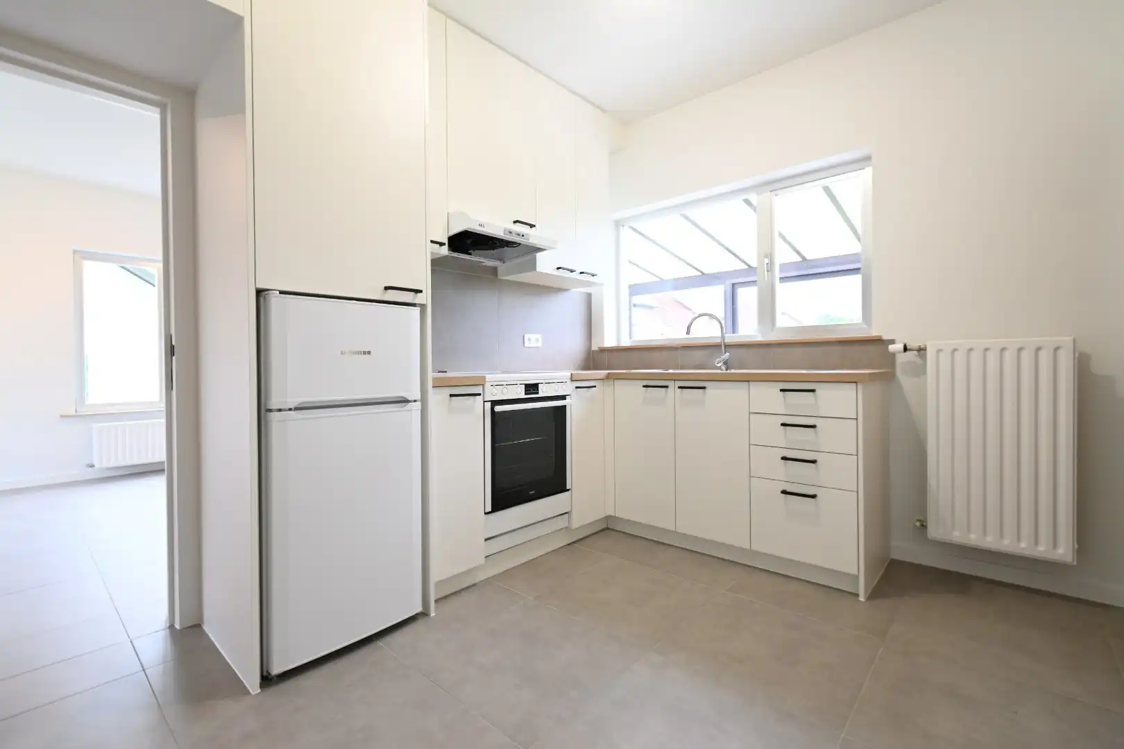 Zorgvuldig gerenoveerde vrijstaande woning met veranda en leuke tuin op 5a24ca te Munsterbilzen foto 11