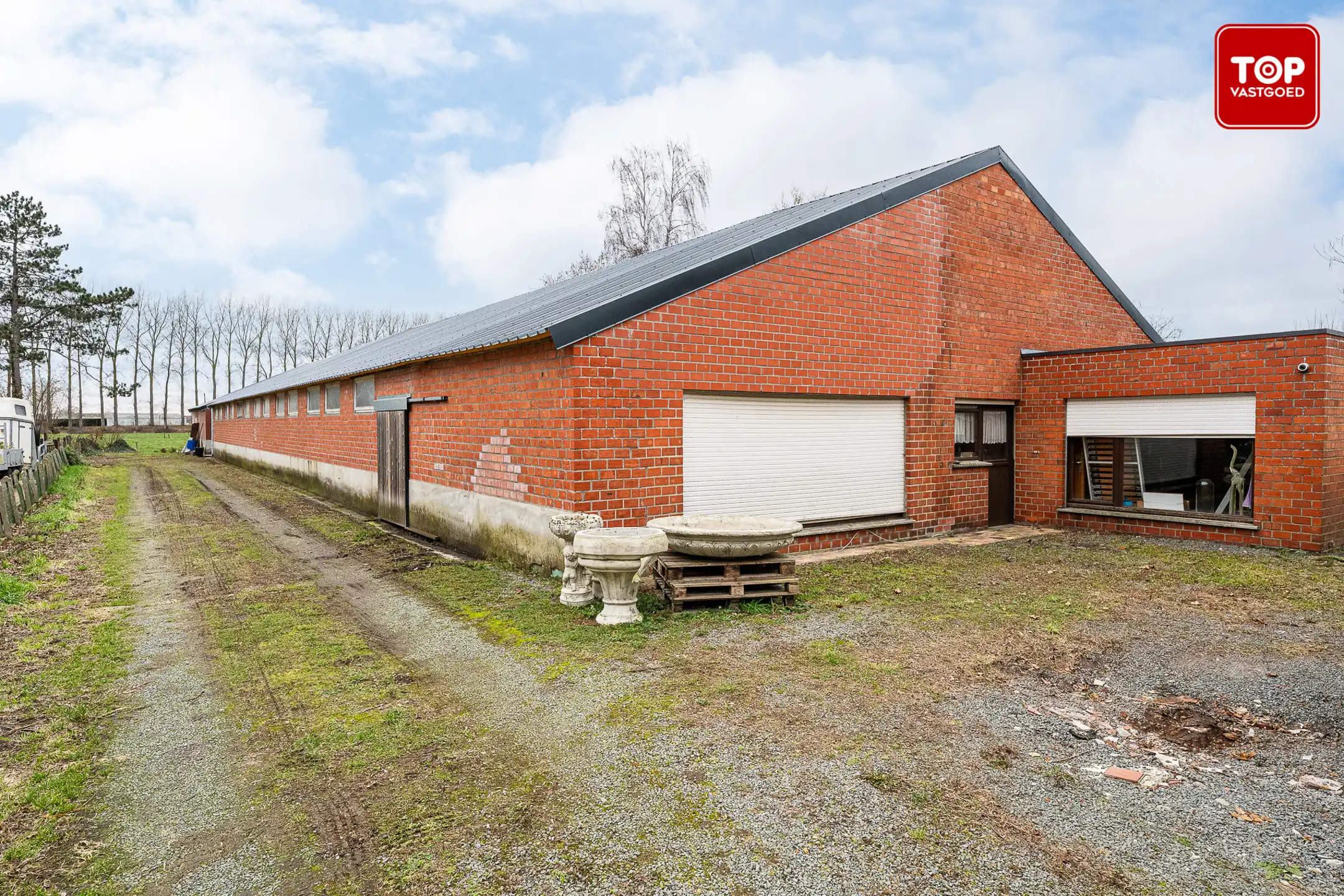 Te renoveren woning met enorme loods foto 26