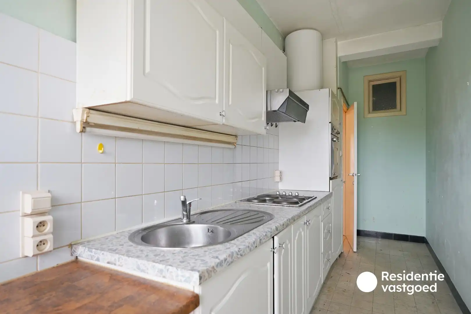 Interessante investeringseigendom met 2 vergunde appartementen, garage en ruime tuin! foto 6