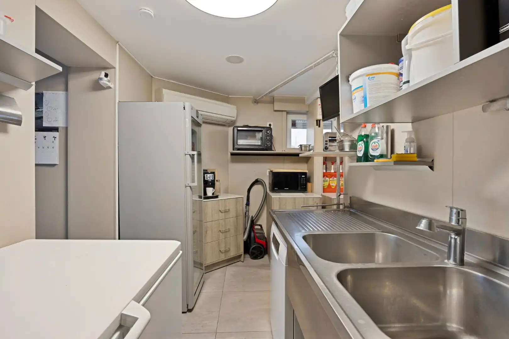 Opbrengsteigendom met handelspand en 3 appartementen te koop in Heverlee op een super ligging! foto 10