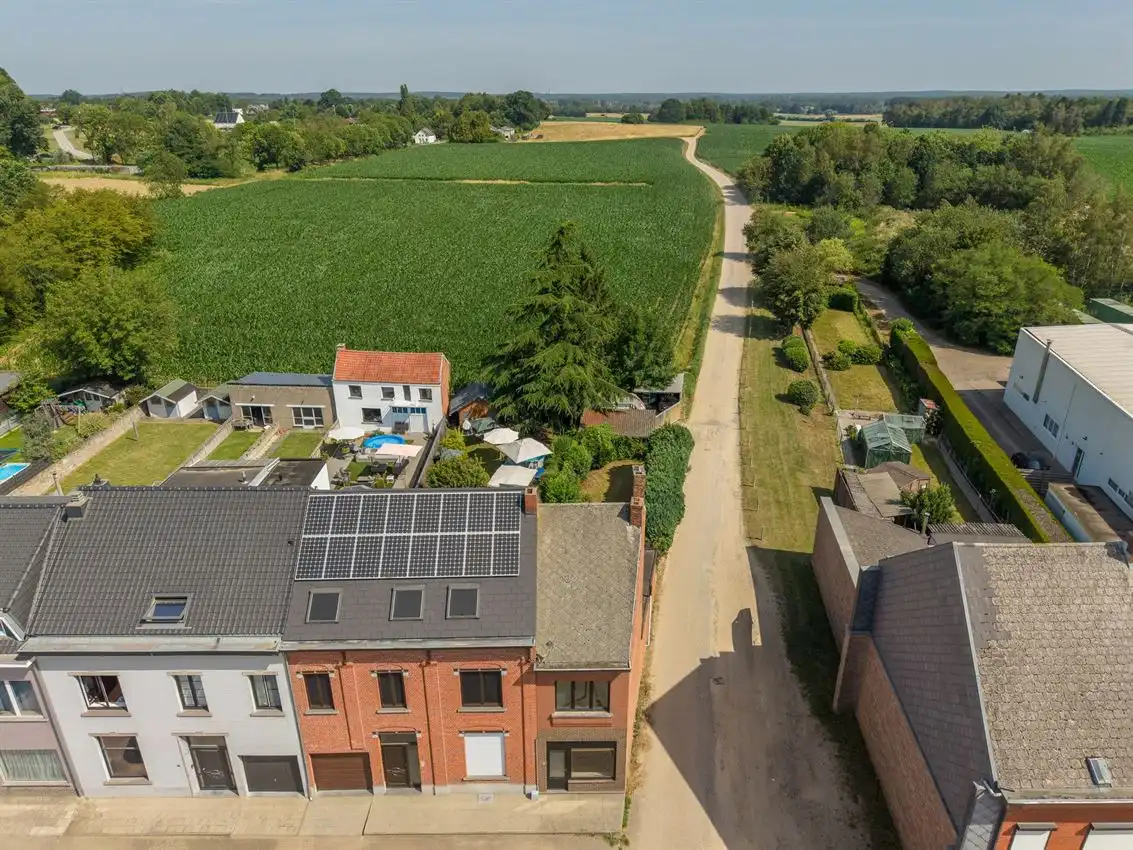Charmante woning met tuin, 2 slk, garage en uniek zicht op groen landschap foto 2