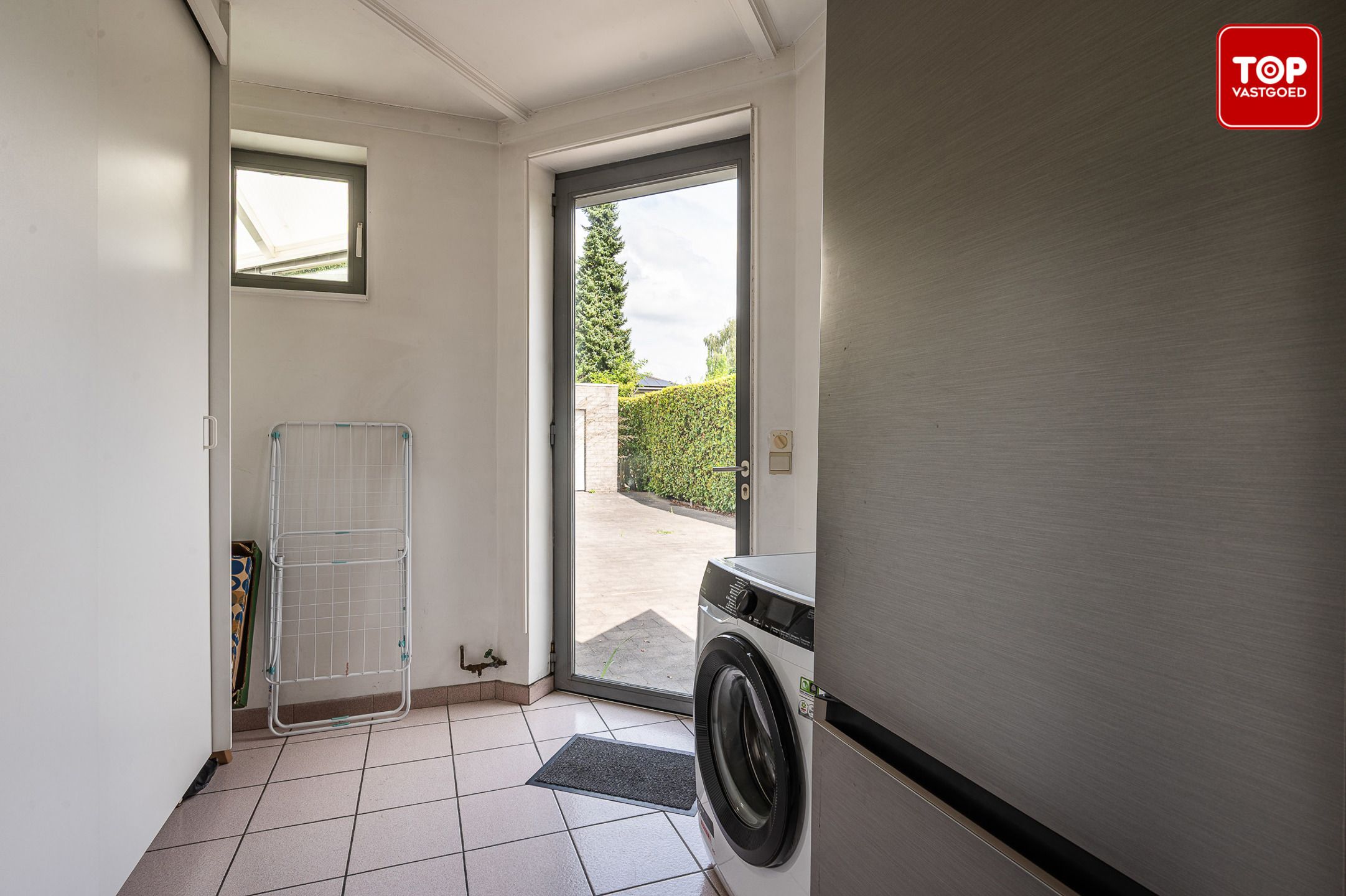 Open bebouwing een perceel van 690m² met mooie tuin en garage.  foto 19