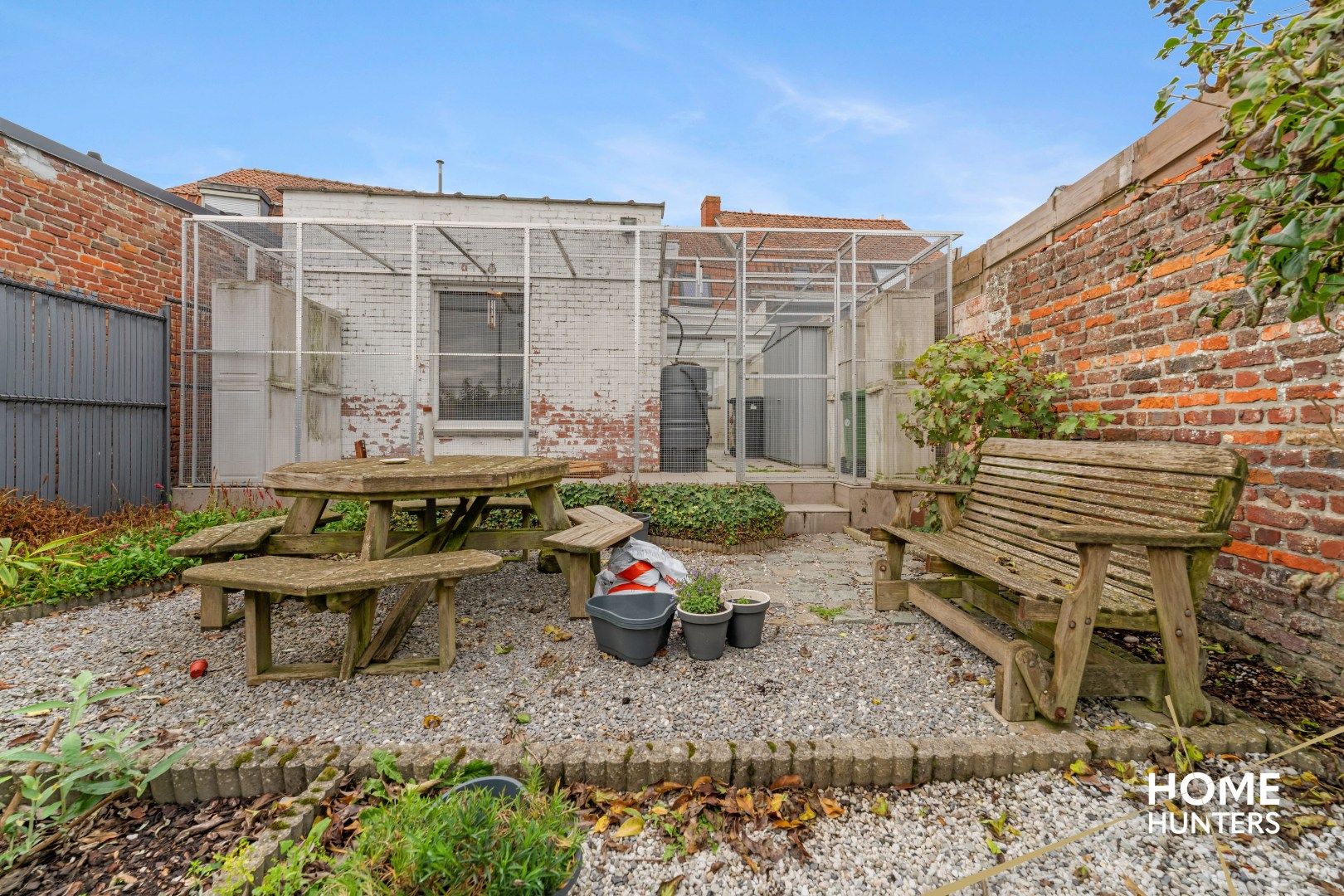Op te frissen woning met charmante tuin in het hart van Mesen foto 19