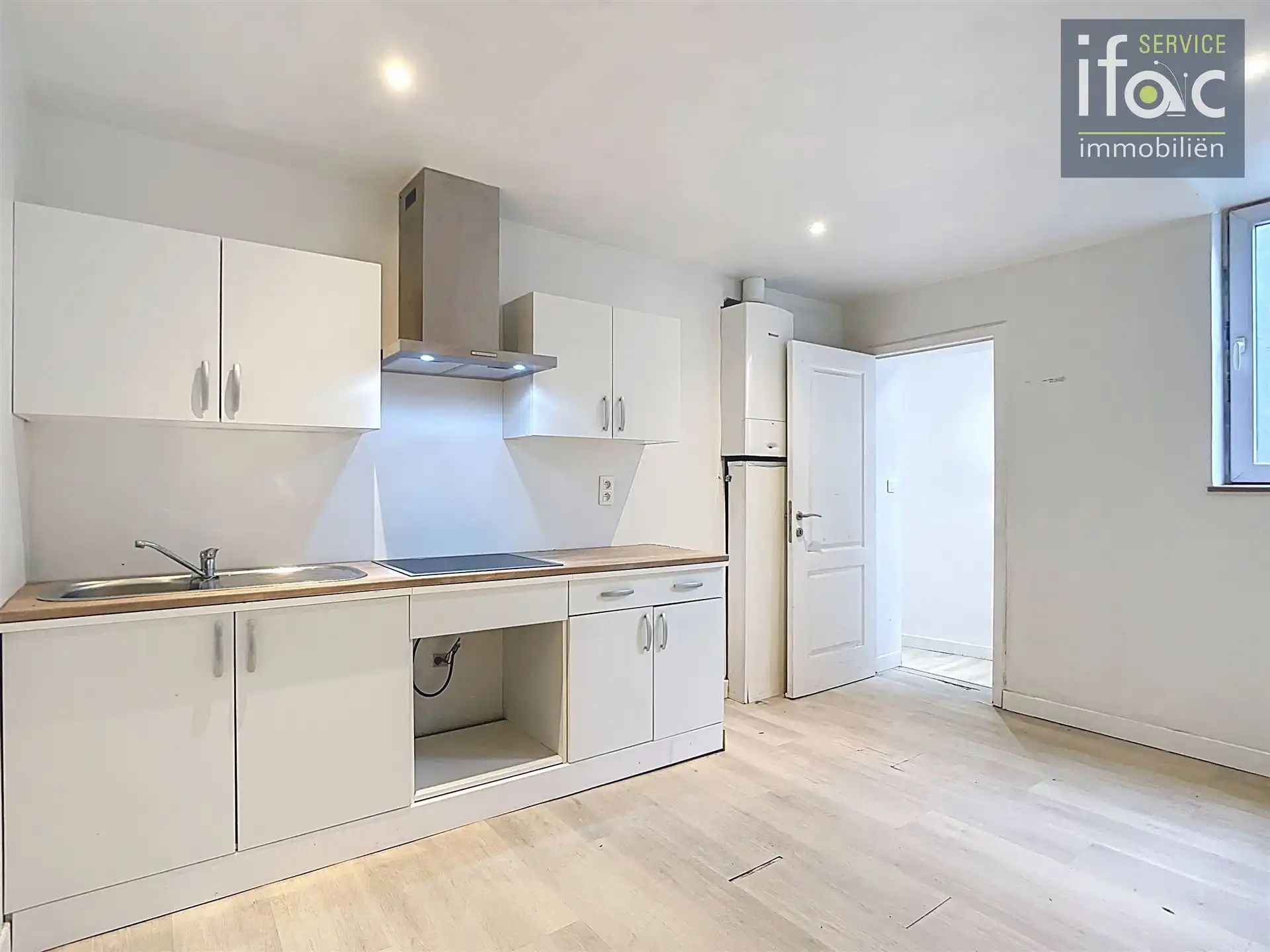 Opbrengstgebouw met handelsruimte en appartment foto 13