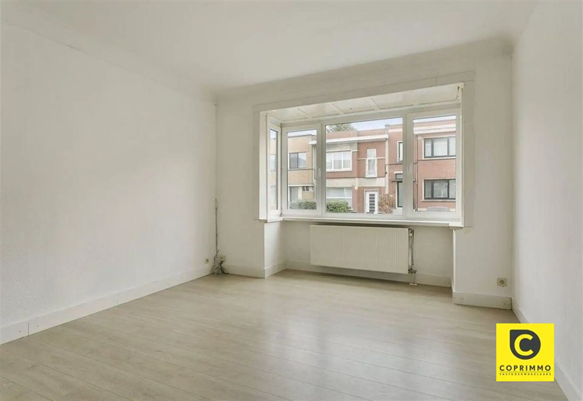 Gelijkvloers appartement met 2 volwaardige slaapkamers foto {{pictureIndex}}