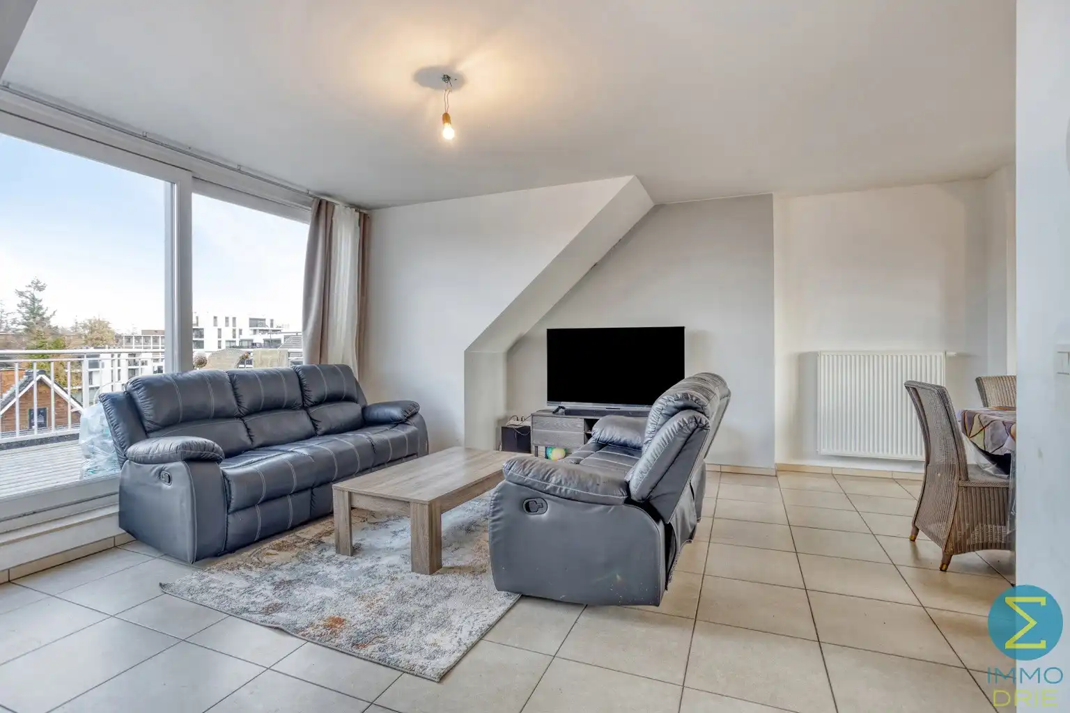 Dakappartement met 1 slpk, groot terras en autostaanplaats foto {{pictureIndex}}