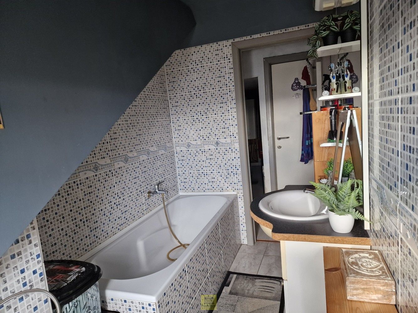 Topper: Opbrengsteigendom met 2 verhuurde appartementen op superlocatie foto 15