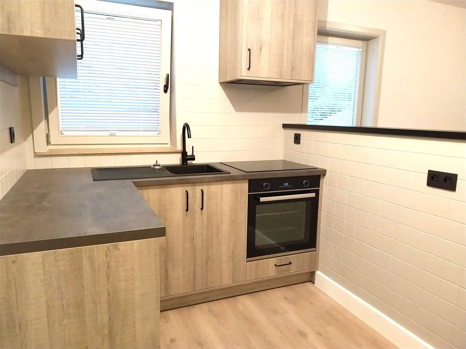 TE HUUR: Gelijkvloers appartement met 2 slaapkamers in het centrum van Zolder! foto 6