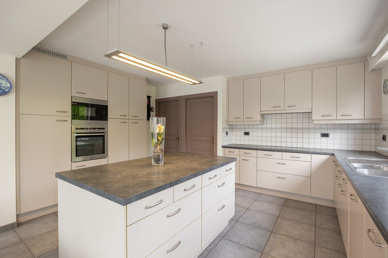 Instapklare, ruime woning met 4 slaapkamers, zonnig terras en multifunctioneel bijgebouw foto 10