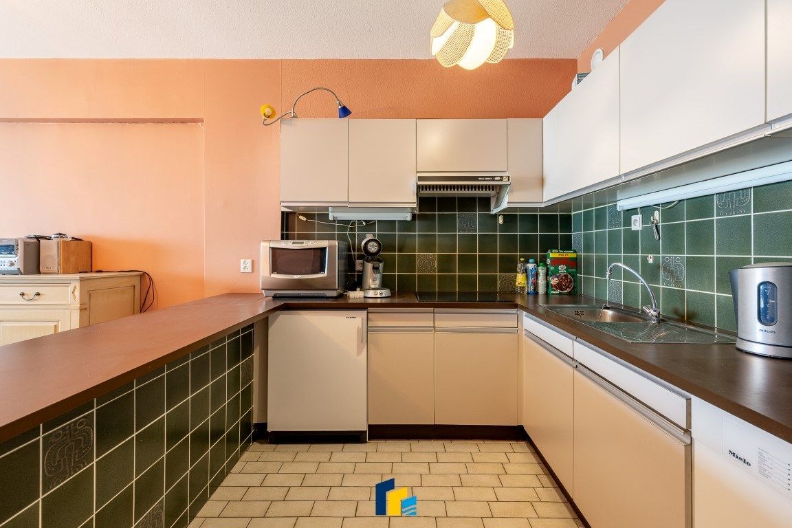 Charmant en ruim appartement met panoramisch zeezicht foto 9